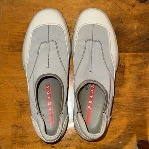 Prada women’s Gray and White Slip-On Sneakers